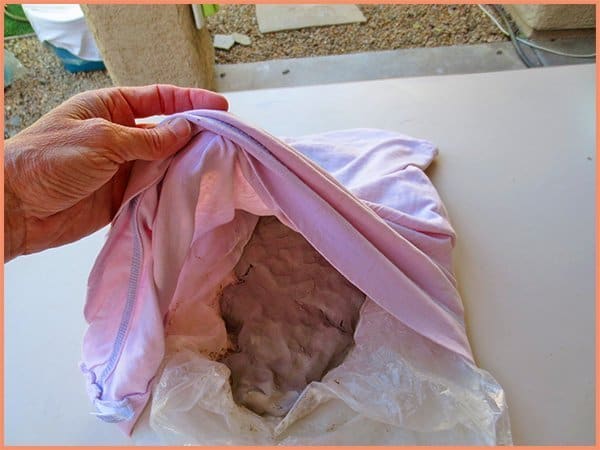 wet clay going in pillow case