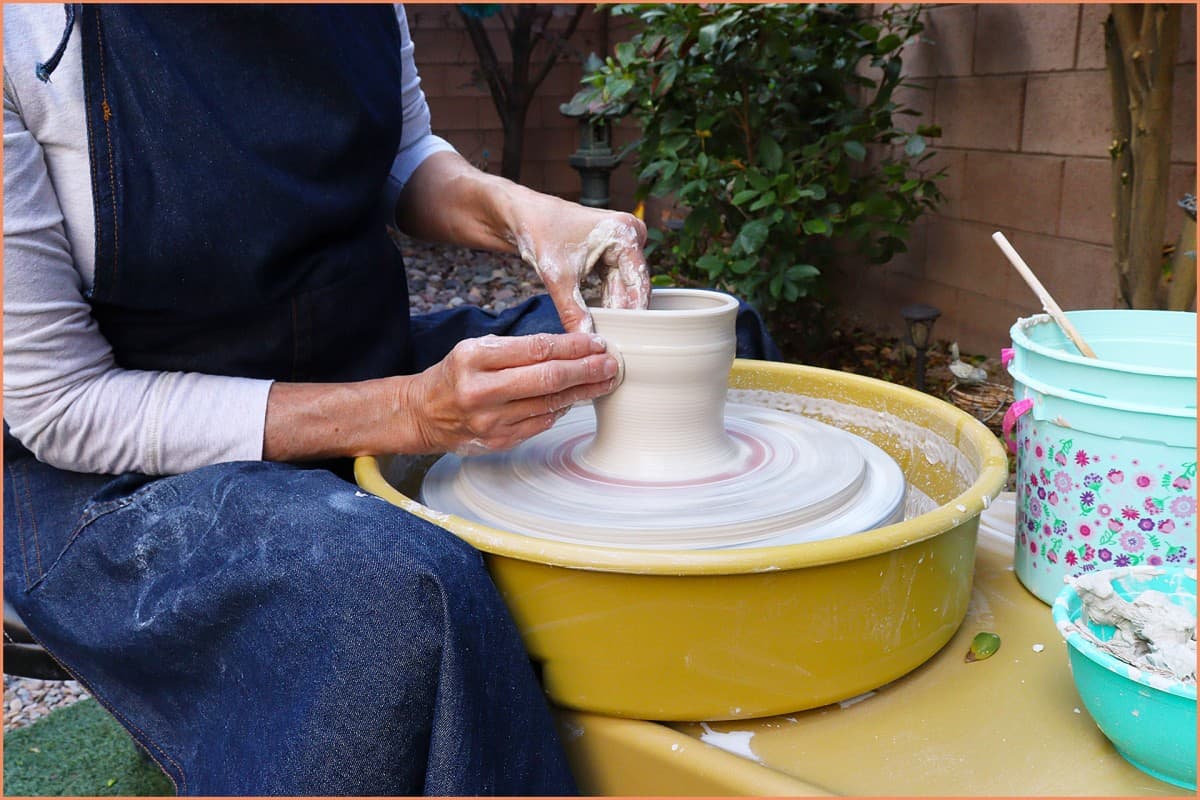 a picture of a potter Throwing a bowl