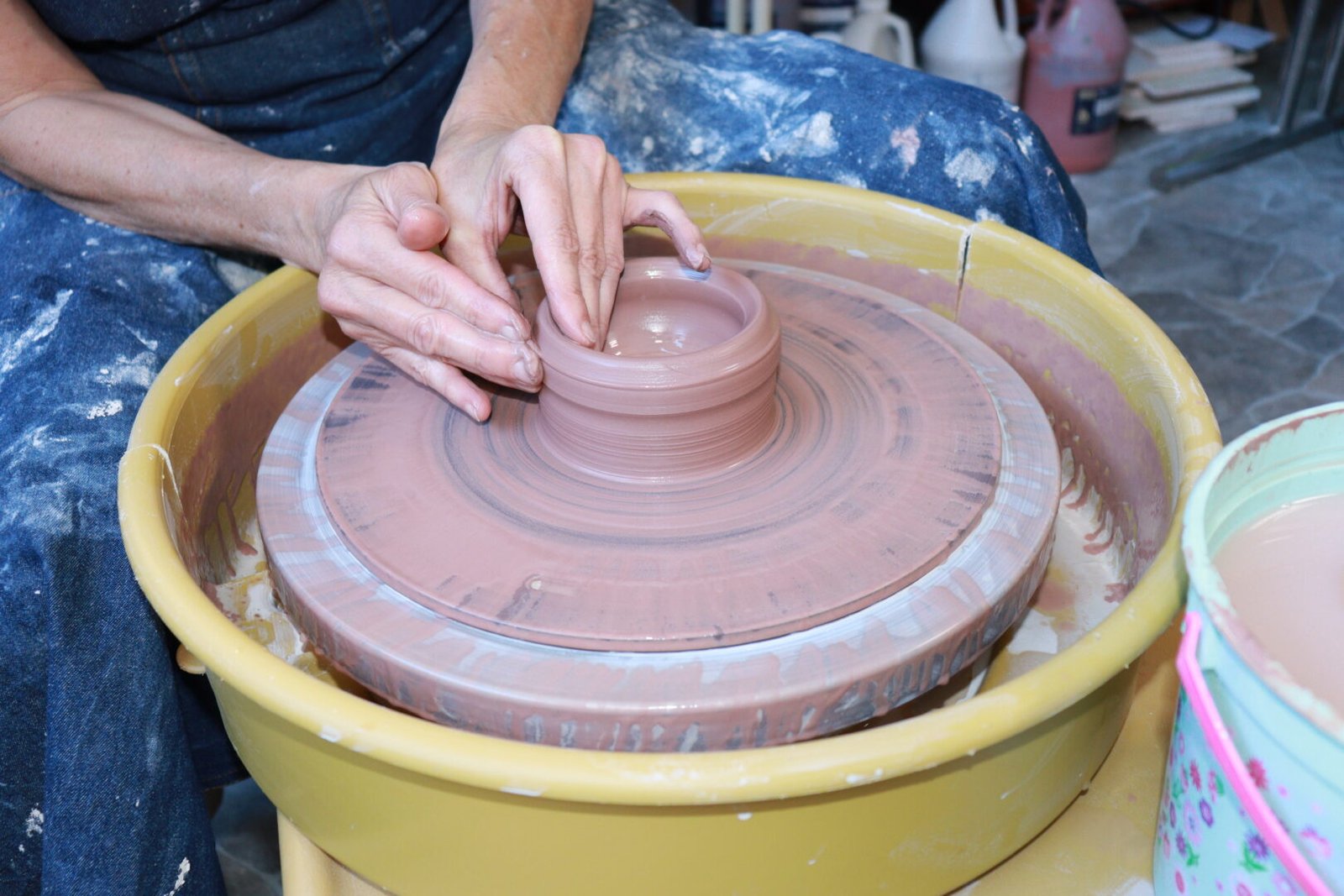 How to Make Pottery - 8 Step Pottery Making Process Throwing a clay pot on the pottery wheel