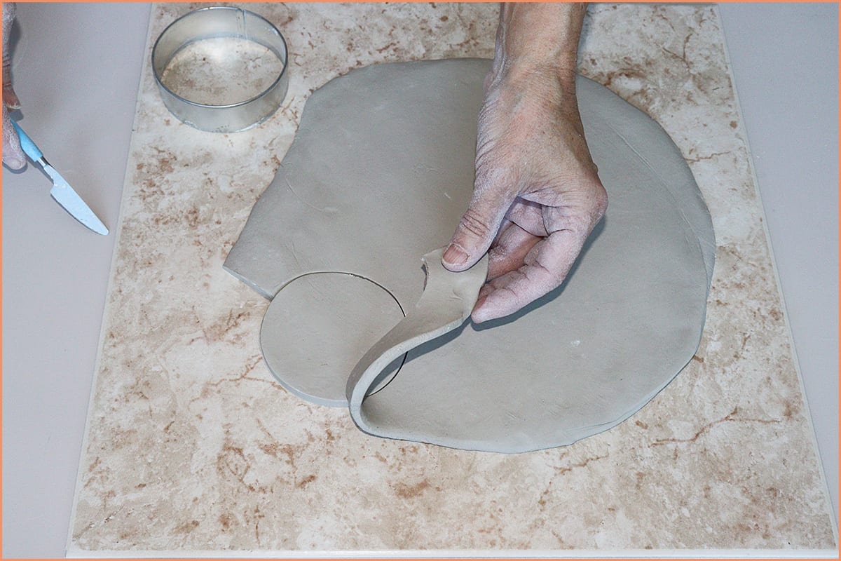 image of a potter Handbuilding on Ceramic tile