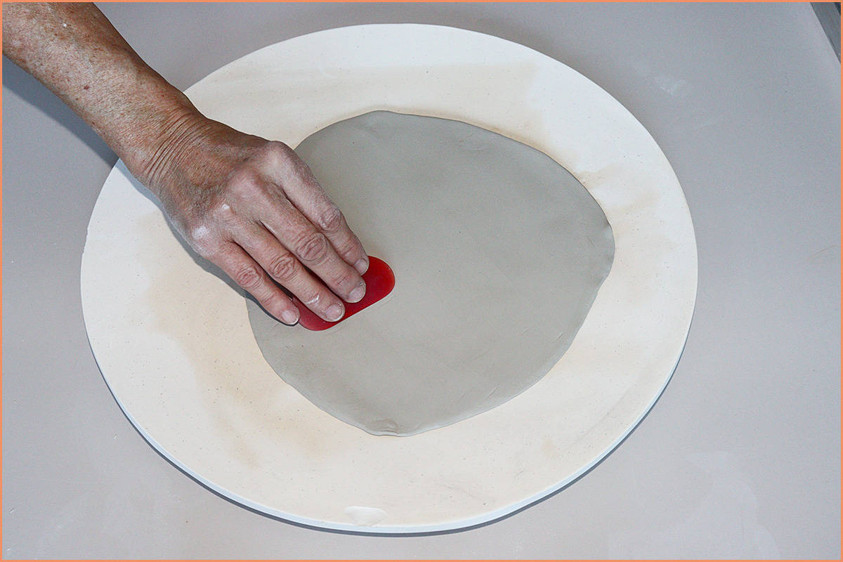 image of a potter on Plaster Surface to hand build