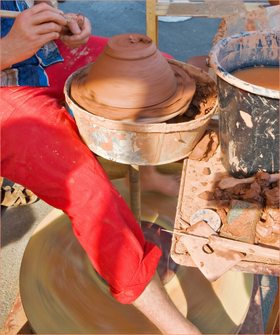 Finishing pottery on a kickwheel