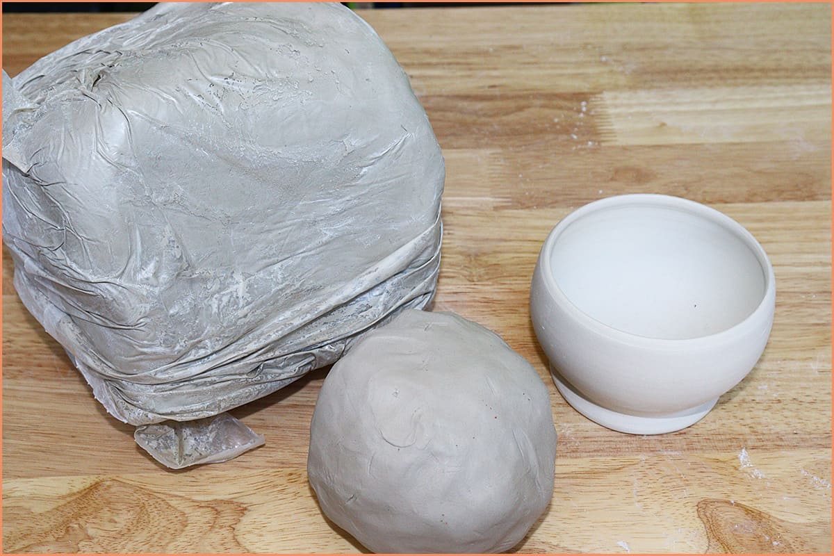 an image of Ball clay and pot
