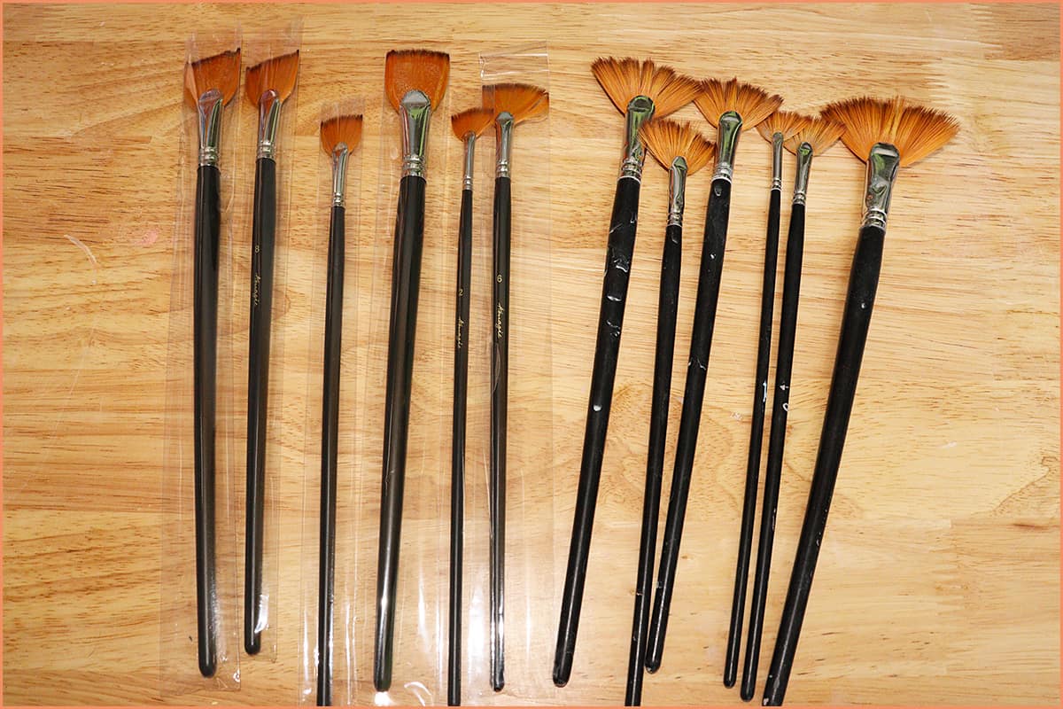 an image of new and old fan brushes