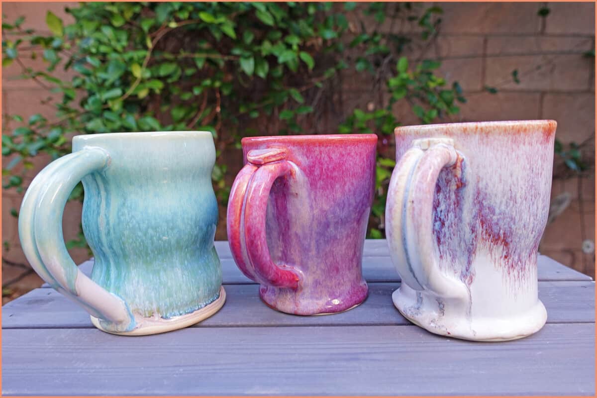 an image of 3 drippy glazed mugs