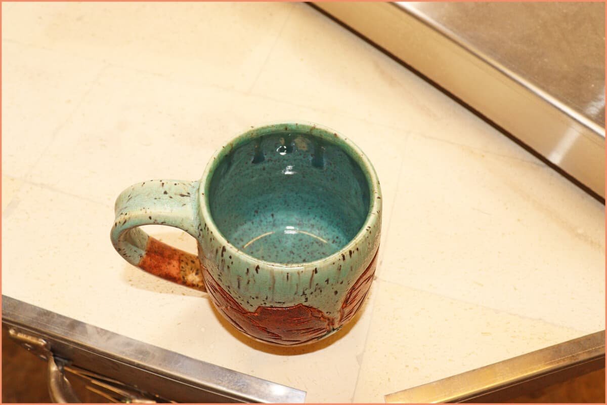 an image of Tilted Kiln St. George Utah glaze on the inside only of the mug