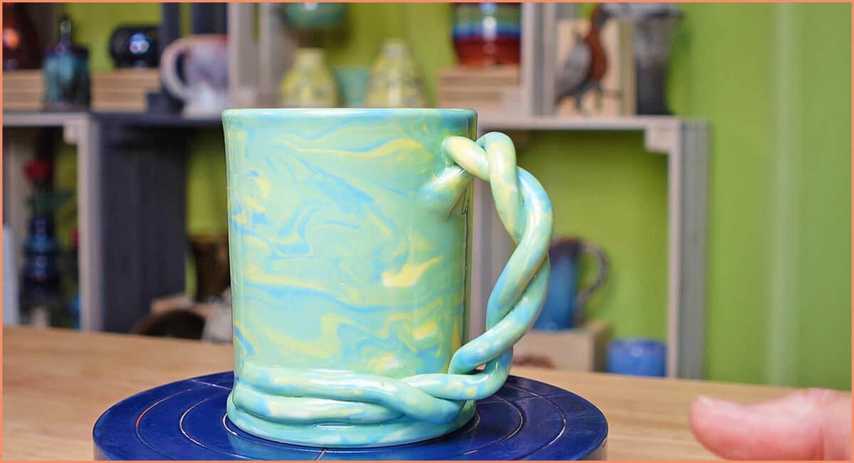 finshed split cup mug blue yellow and green