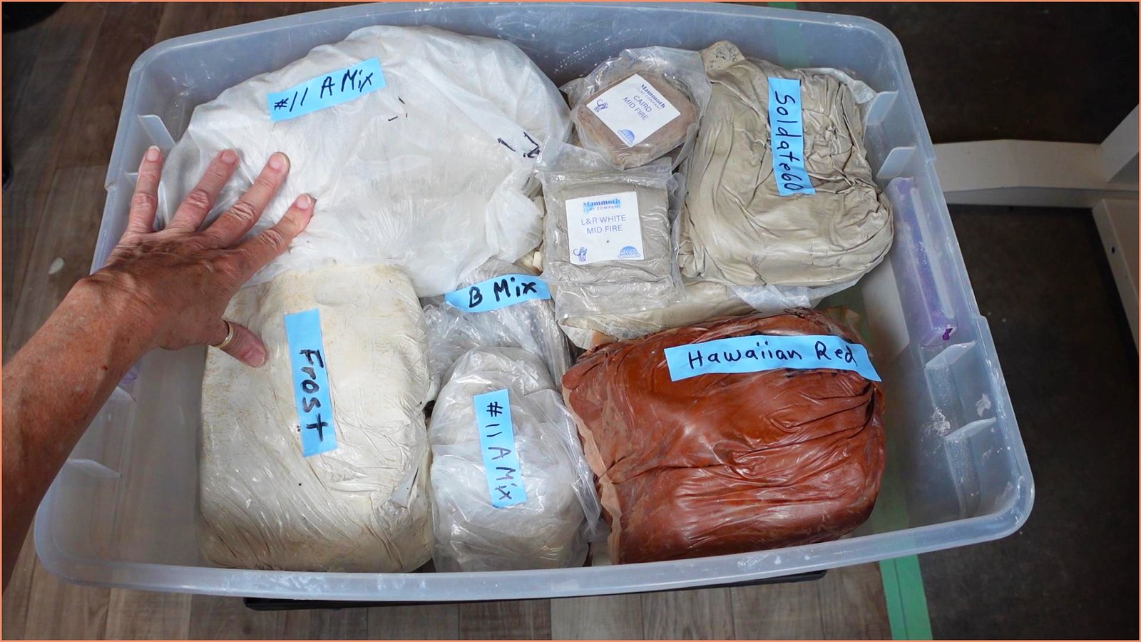 an image of bags of clay that are labeled